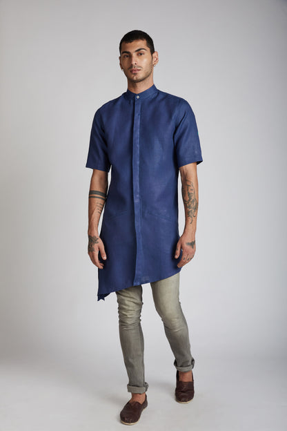 Discover the fresh change with the Metamorphosis Kurta. Crafted with asymmetrical cuts and concealed buttons, this kurta is perfect for any occasion. Made from 100% hemp, it offers durability and style. Stay comfortable and fashionable with this unique piece.