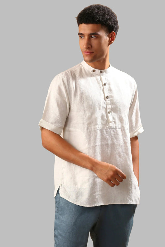Cypress Classic Shirt S by B Label is a stylish and comfortable shirt made of 100% hemp. With its mandarin collar, side seam pockets, and double buttoned style, it is perfect for any occasion. The shirt also features half sleeves for a trendy look. Get yours now and elevate your wardrobe with this classic shirt.