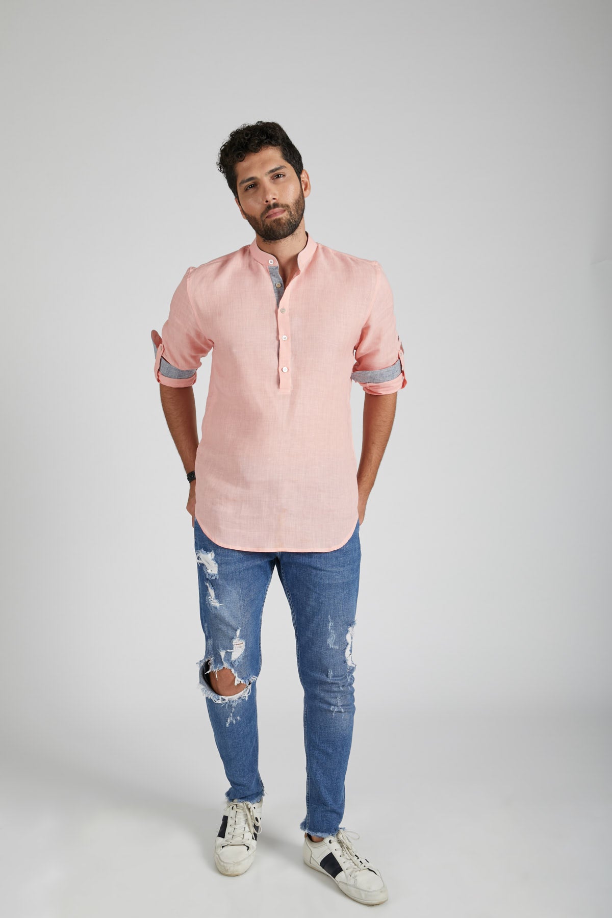 Earthen Mandarin Casual Shirt S by B Label is a casual shirt with a mandarin collar and buttons that run halfway down the front. The contrasting button placket adds a stylish touch. The sleeves can be rolled up and buttoned for a comfortable look. Made with 100% Hemp material, this shirt is perfect for daily wear. Machine wash or dry clean for easy care. Delivery within 5-8 days.