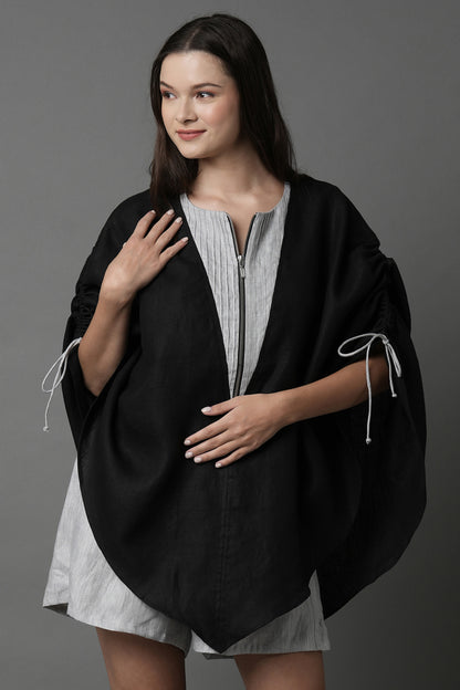 Unleash your spirit with this zipper top
designed for every kind of body. A 
breezy poncho, this overlay can be
slipped over a swimsuit, a tank top
or be worn as is. Its pin tuck and 
adjustable drawstring details at the 
shoulder finish the top with the
perfect elements.